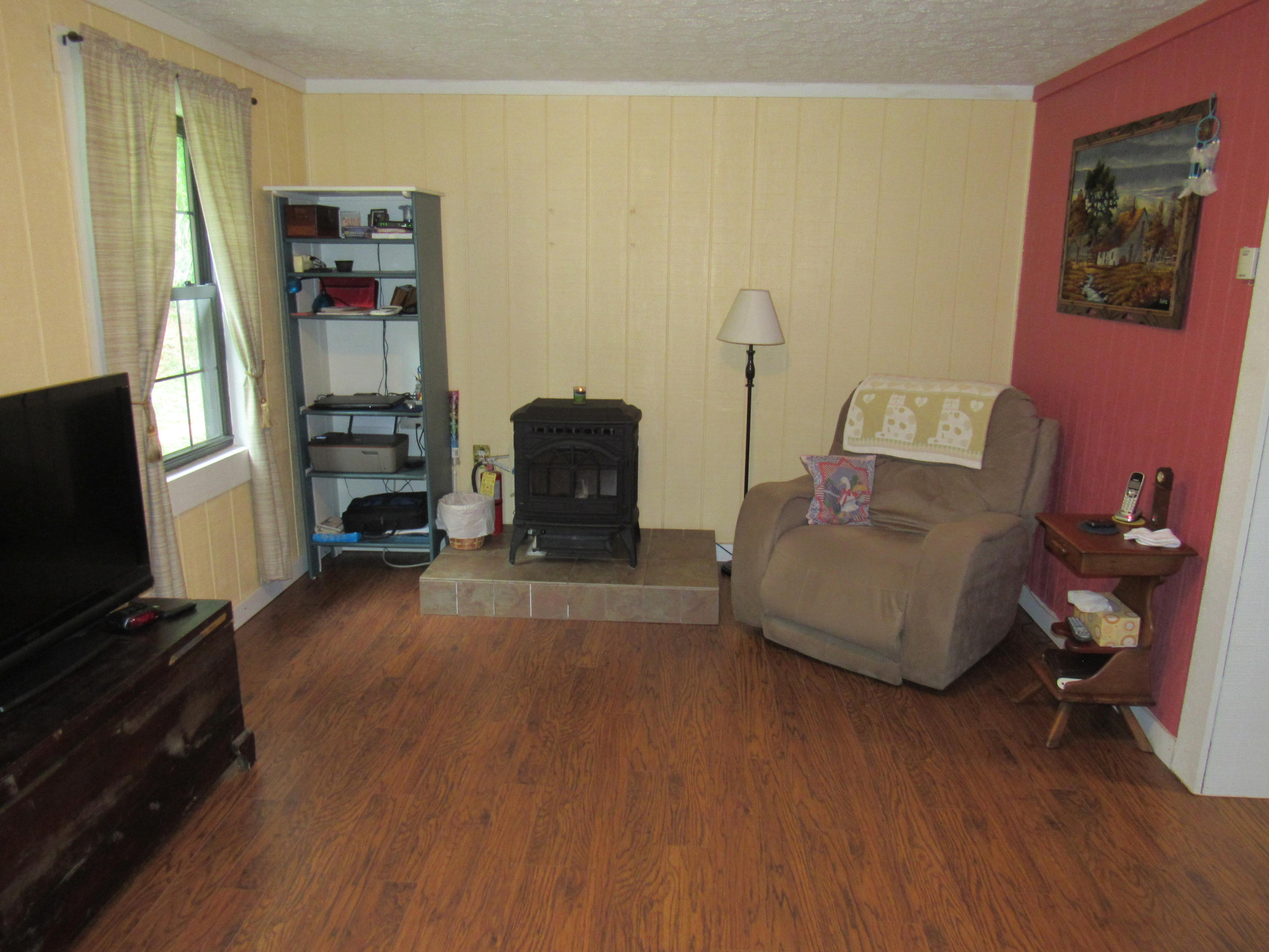 2700 Johnny's Ridge Road Ferrum, VA 24088 - Photo 3 of 32 a living room with furniture and a flat screen tv