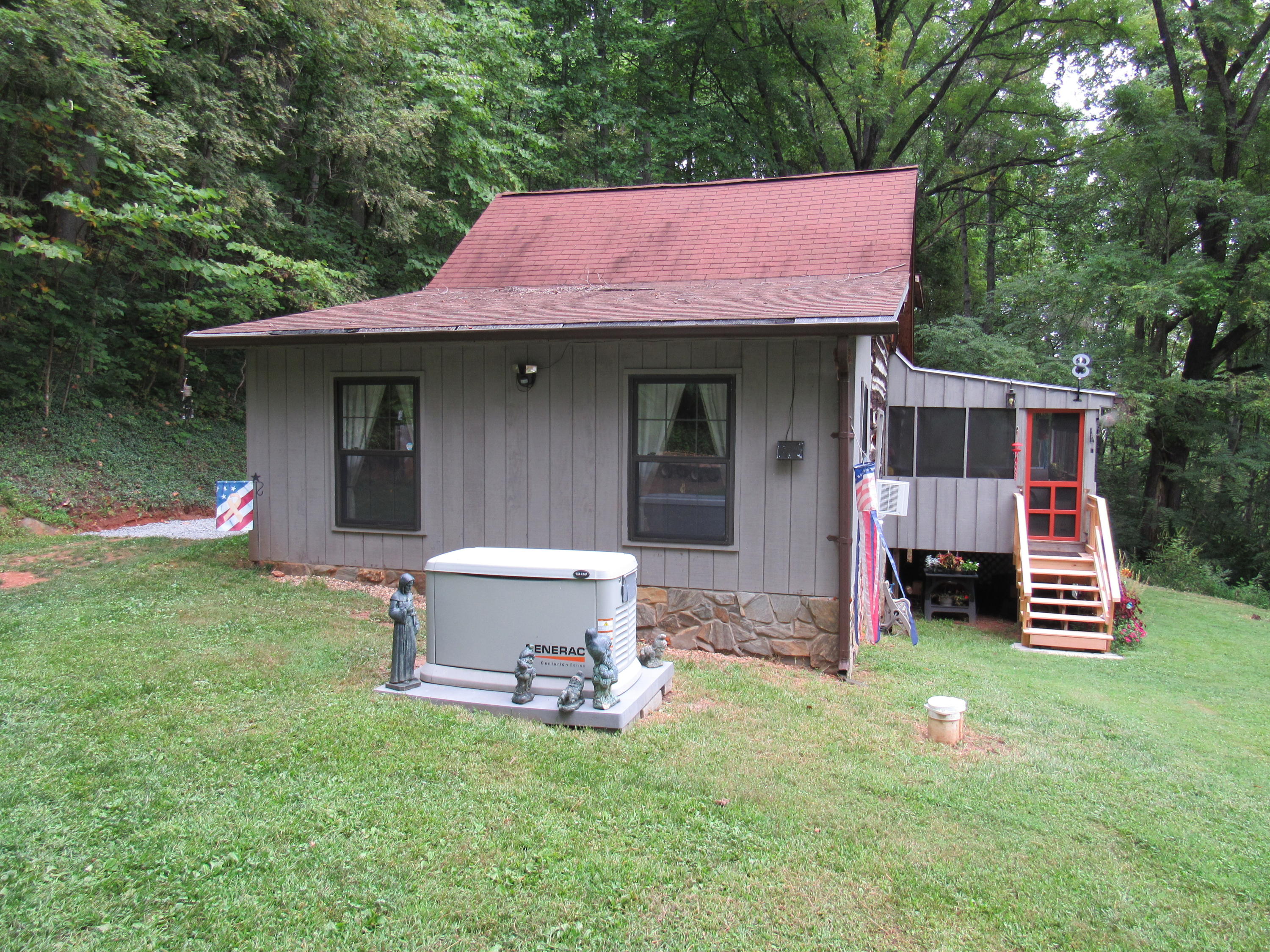 2700 Johnny's Ridge Road Ferrum, VA 24088 - Photo 25 of 32 a front view of a house with a yard