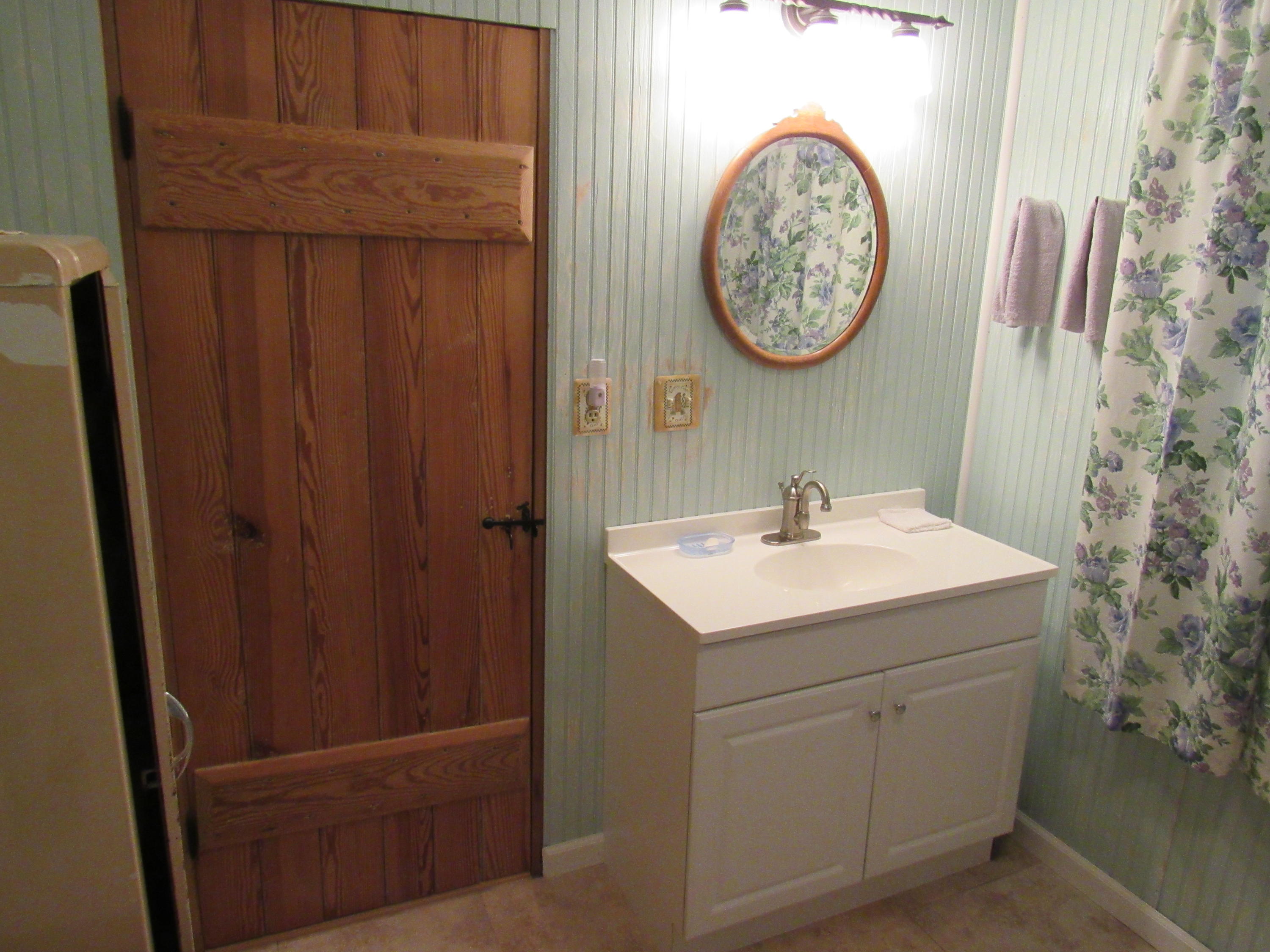 2700 Johnny's Ridge Road Ferrum, VA 24088 - Photo 9 of 32 a bathroom with a sink and a mirror