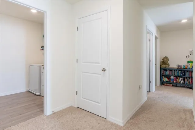 a view of a livingroom with furniture and cabinet