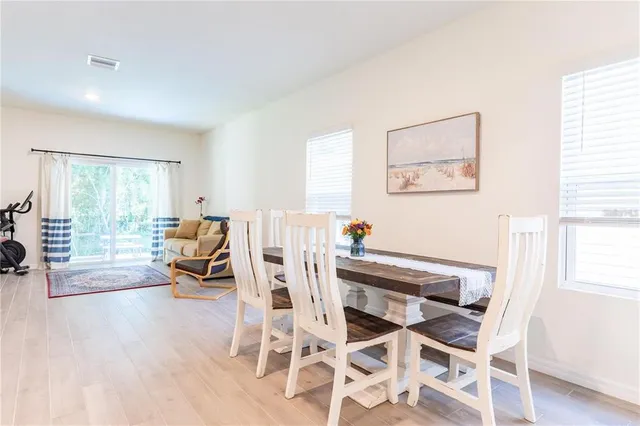 a view of a livingroom with furniture and a work space