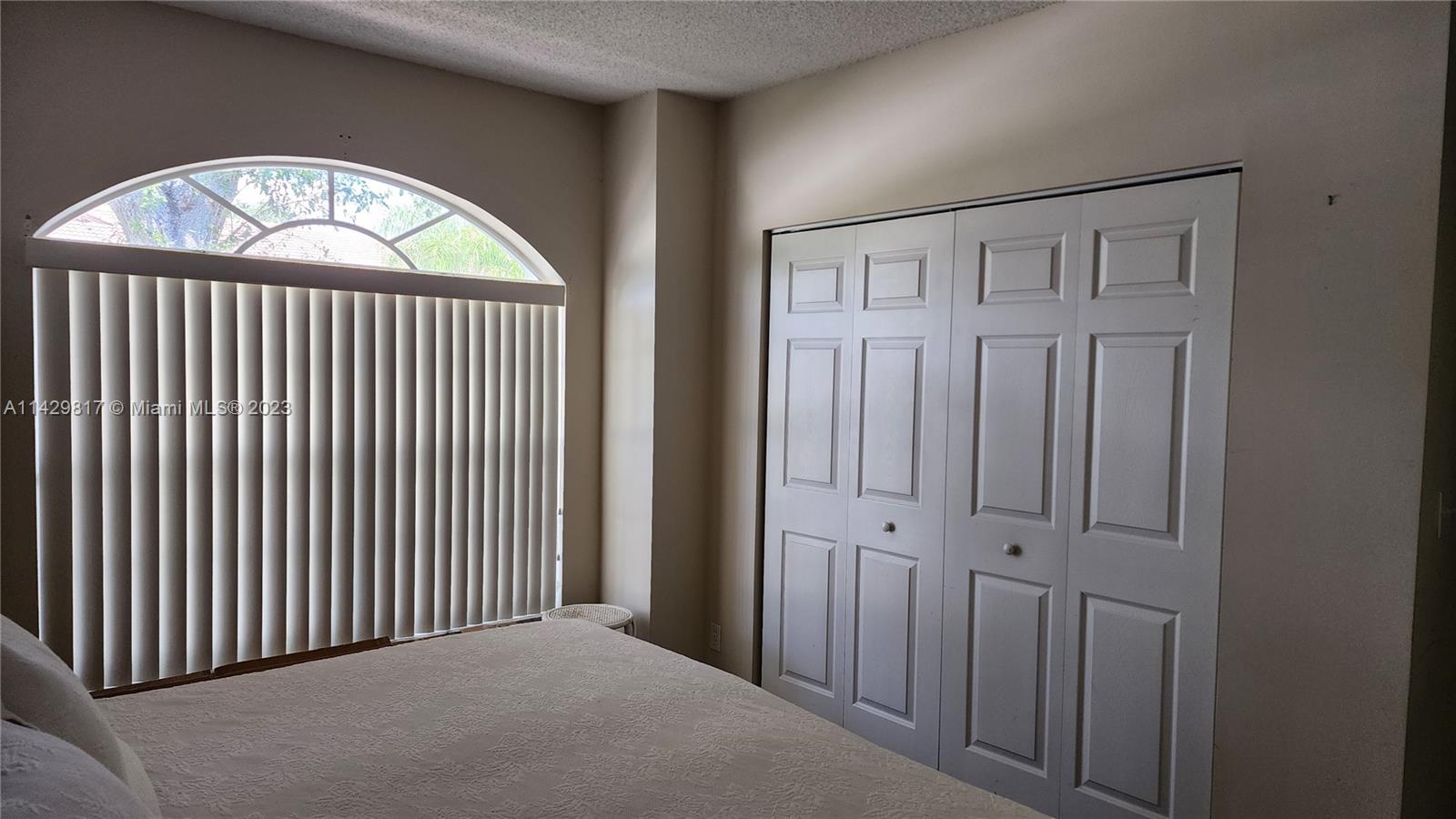 21128 Vía Solano Boca Raton, FL 33433 - Photo 15 of 25 a view of an entryway with wooden floor