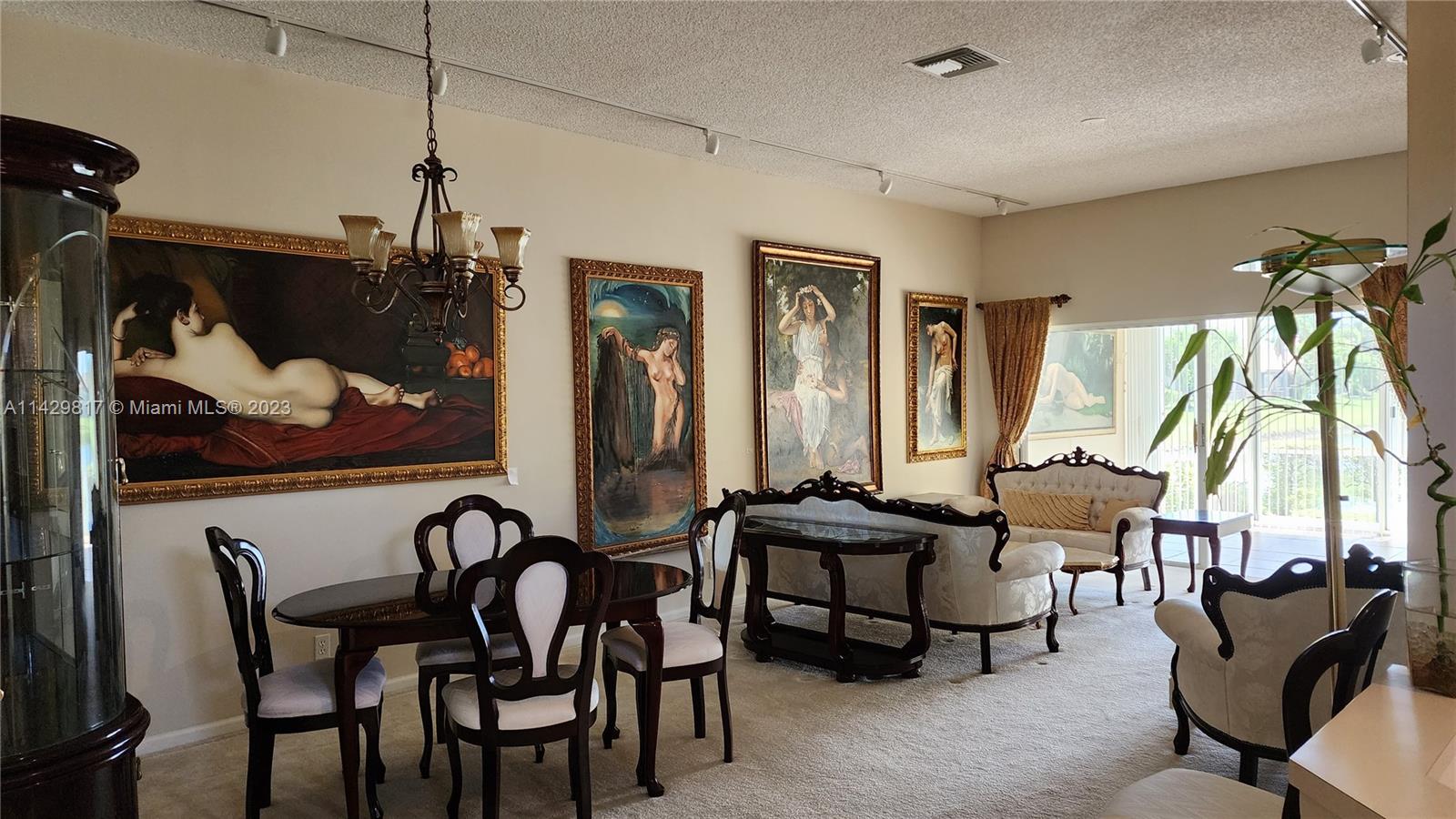 21128 Vía Solano Boca Raton, FL 33433 - Photo 19 of 25 a view of a livingroom with furniture and window
