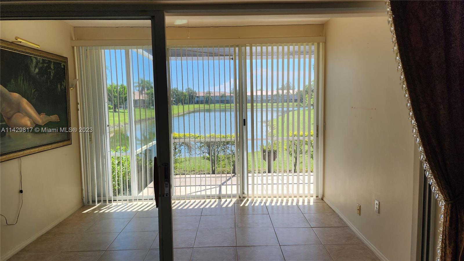 21128 Vía Solano Boca Raton, FL 33433 - Photo 21 of 25 a view of a room that has a large window