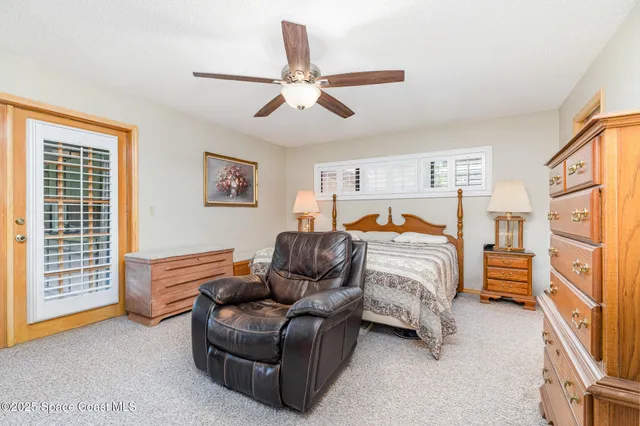 a bedroom with furniture and a window
