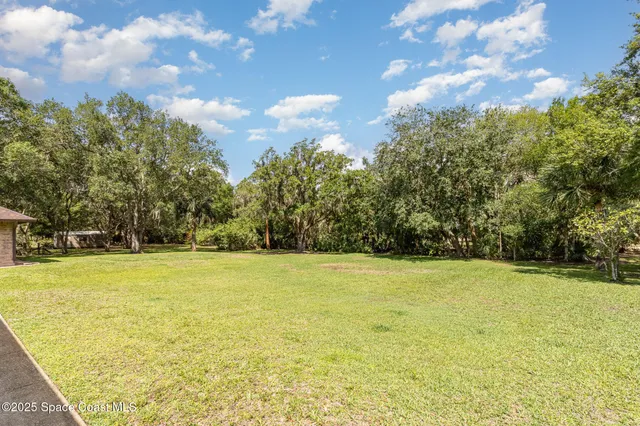 a view of yard with ocean view