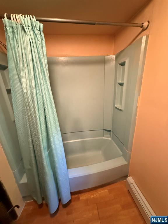78 Woodland Road Ringwood, NJ 07456 - Photo 14 of 33 a bathroom with a bathtub and shower