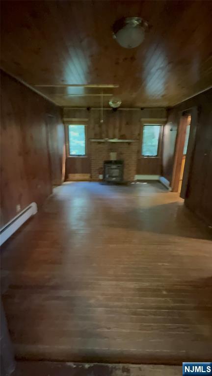 78 Woodland Road Ringwood, NJ 07456 - Photo 17 of 33 a view of empty room with wooden floor