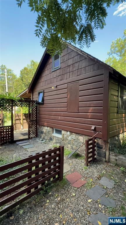 78 Woodland Road Ringwood, NJ 07456 - Photo 18 of 33 a view of a house with a yard