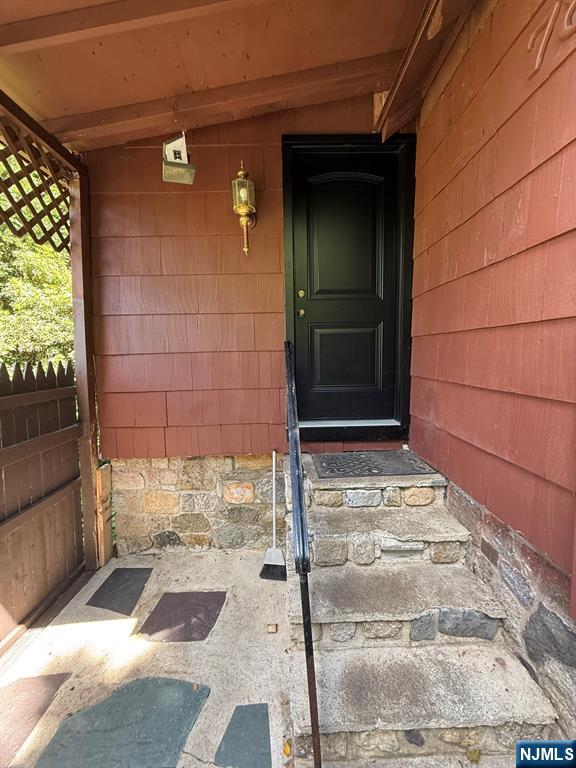 78 Woodland Road Ringwood, NJ 07456 - Photo 6 of 33 a view of a door of the house