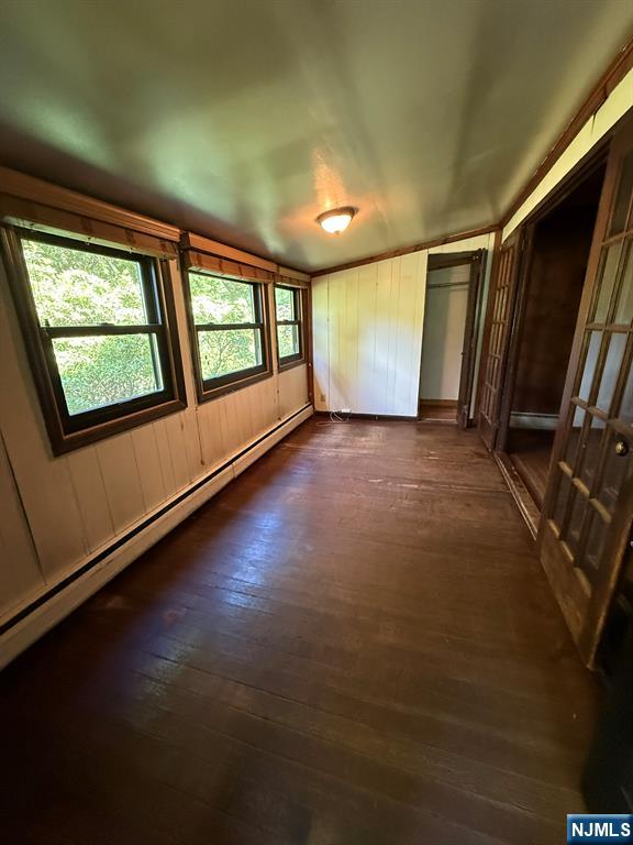 78 Woodland Road Ringwood, NJ 07456 - Photo 7 of 33 an empty room with windows