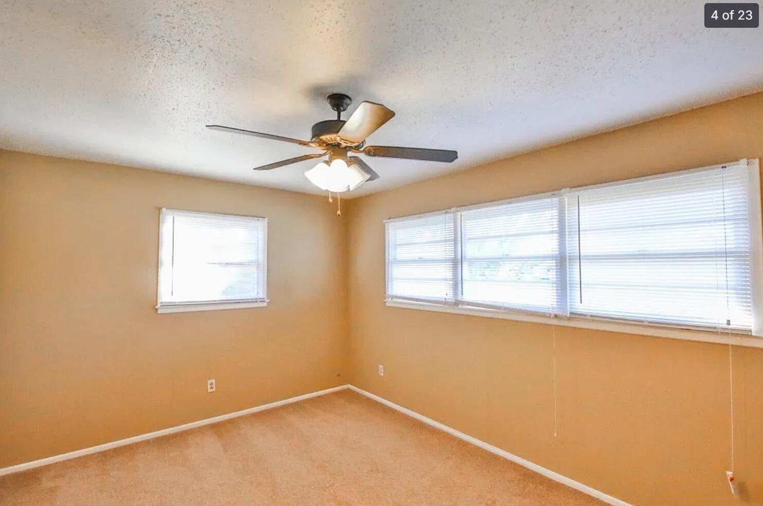 5426 33rd Street Lubbock, TX 79407 - Photo 11 of 27 a view of an empty room with a window