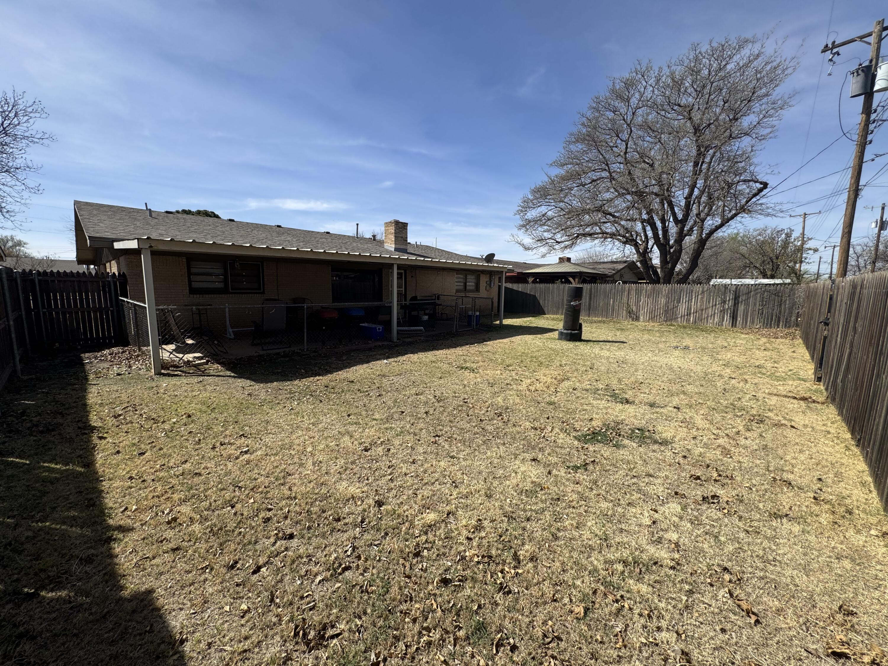 5426 33rd Street Lubbock, TX 79407 - Photo 26 of 27 a view of a backyard of the house