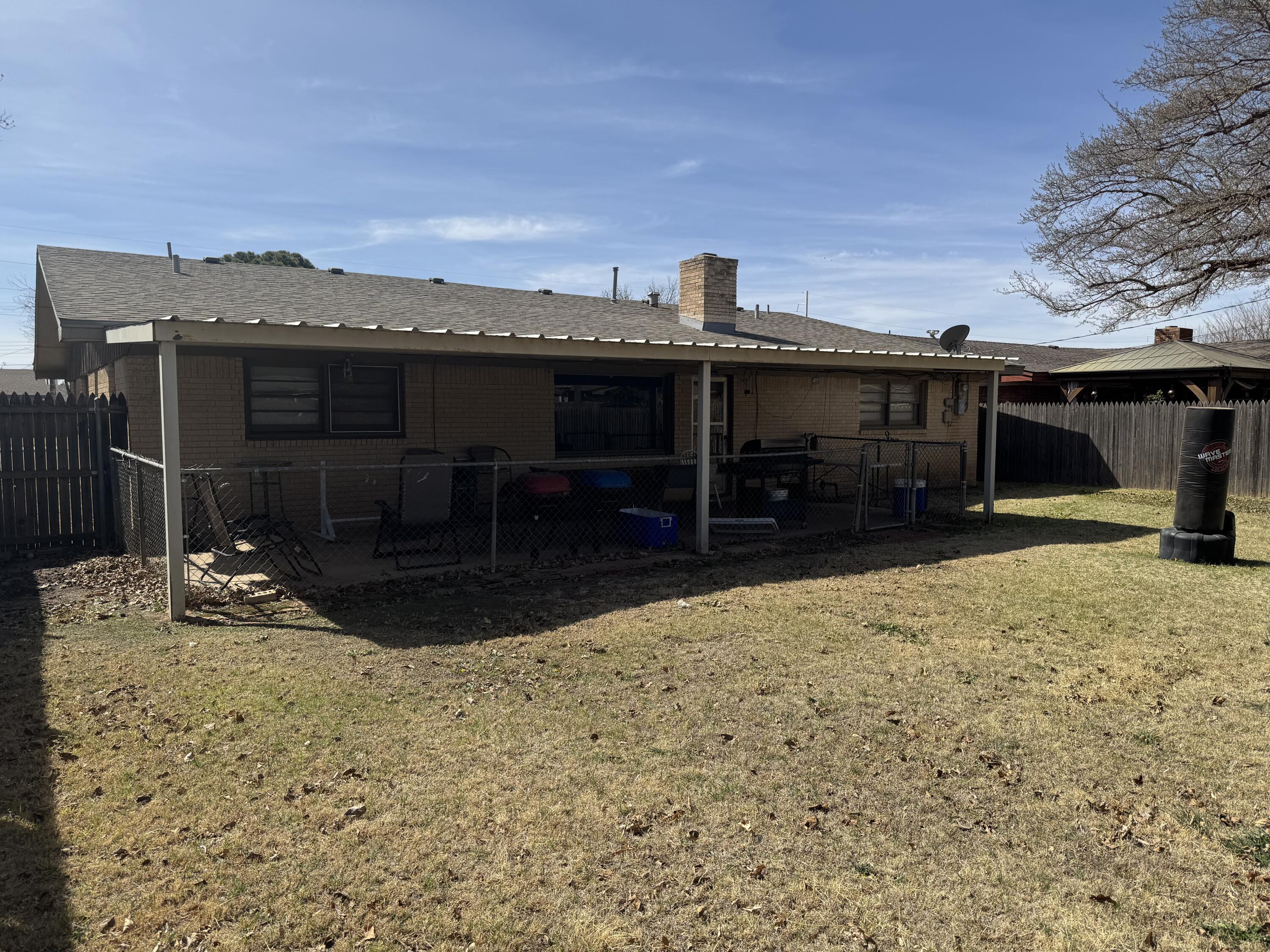 5426 33rd Street Lubbock, TX 79407 - Photo 27 of 27 a view of a house with a yard