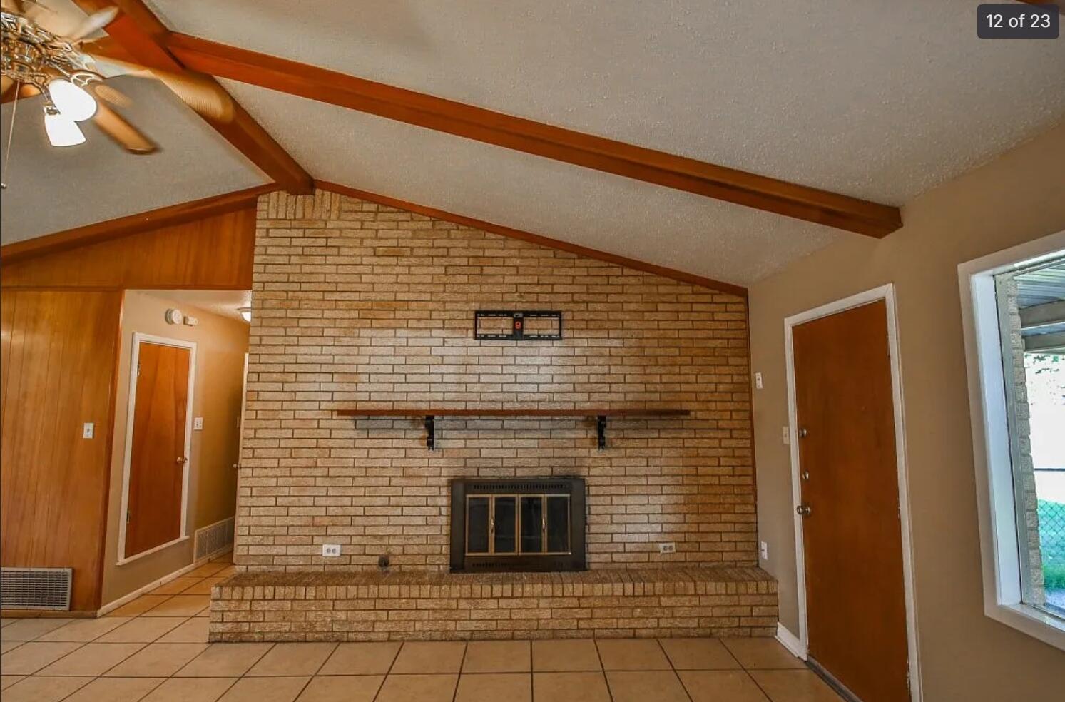 5426 33rd Street Lubbock, TX 79407 - Photo 4 of 27 a brick building with glass windows