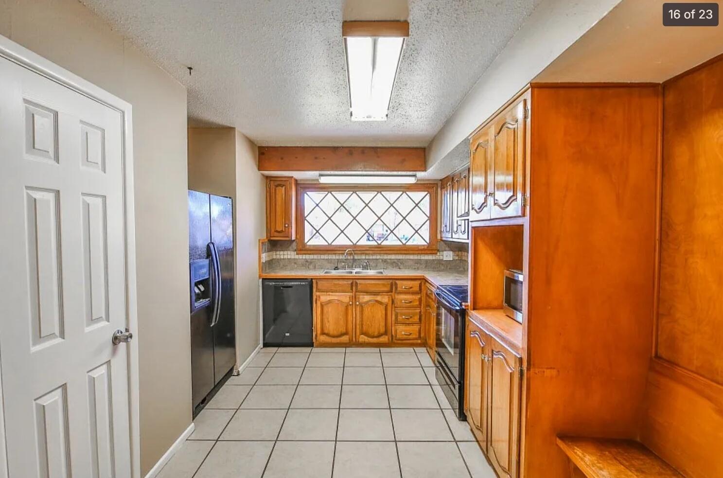 5426 33rd Street Lubbock, TX 79407 - Photo 7 of 27 a bathroom with a sink a toilet and a shower