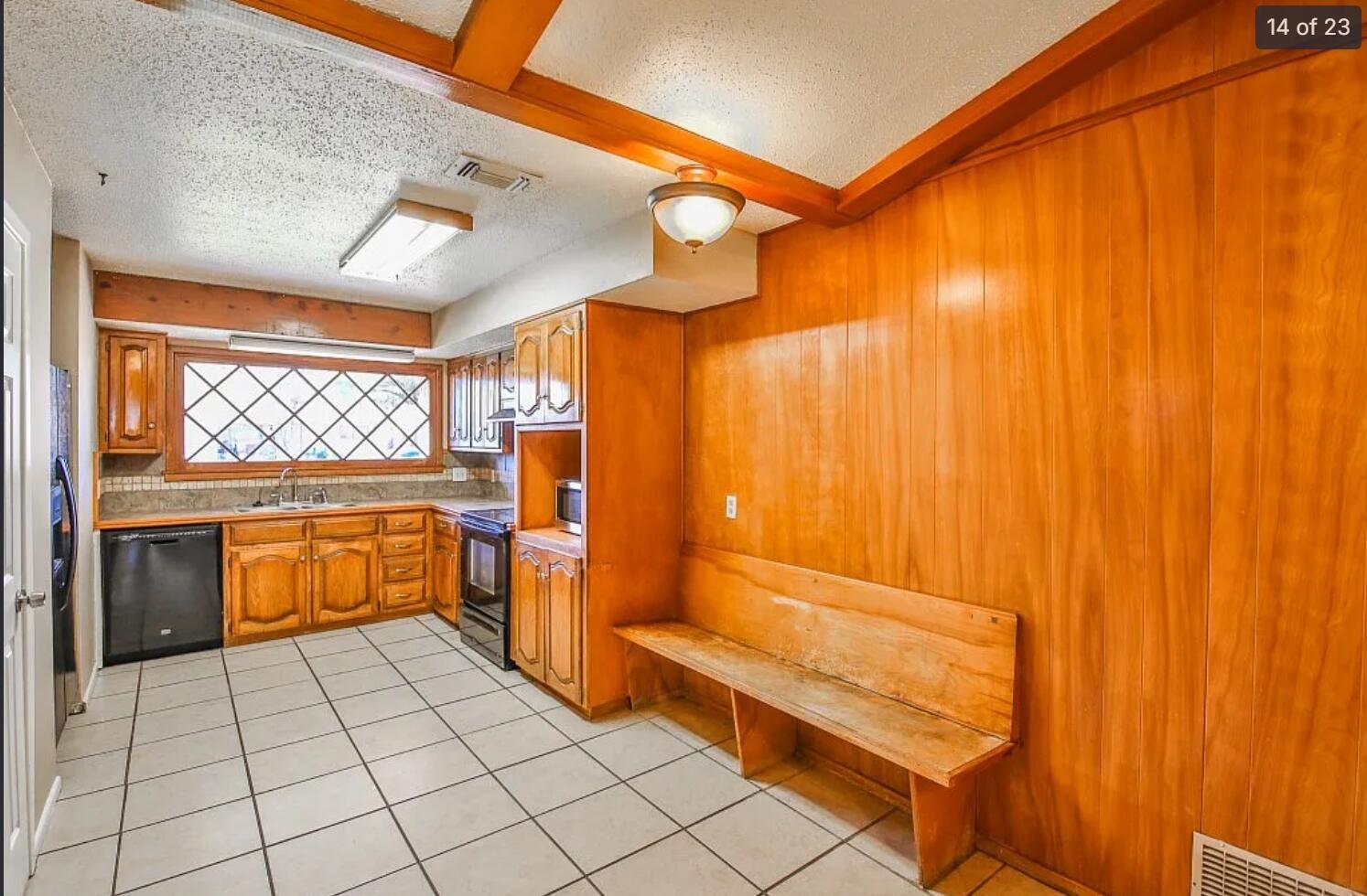 5426 33rd Street Lubbock, TX 79407 - Photo 9 of 27 a bathroom with a sink a toilet and bathtub