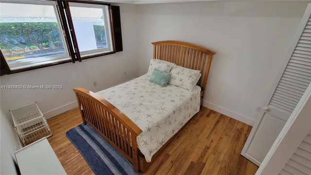 a view of balcony and wooden floor