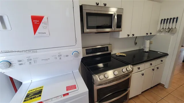 a view of kitchen and sink
