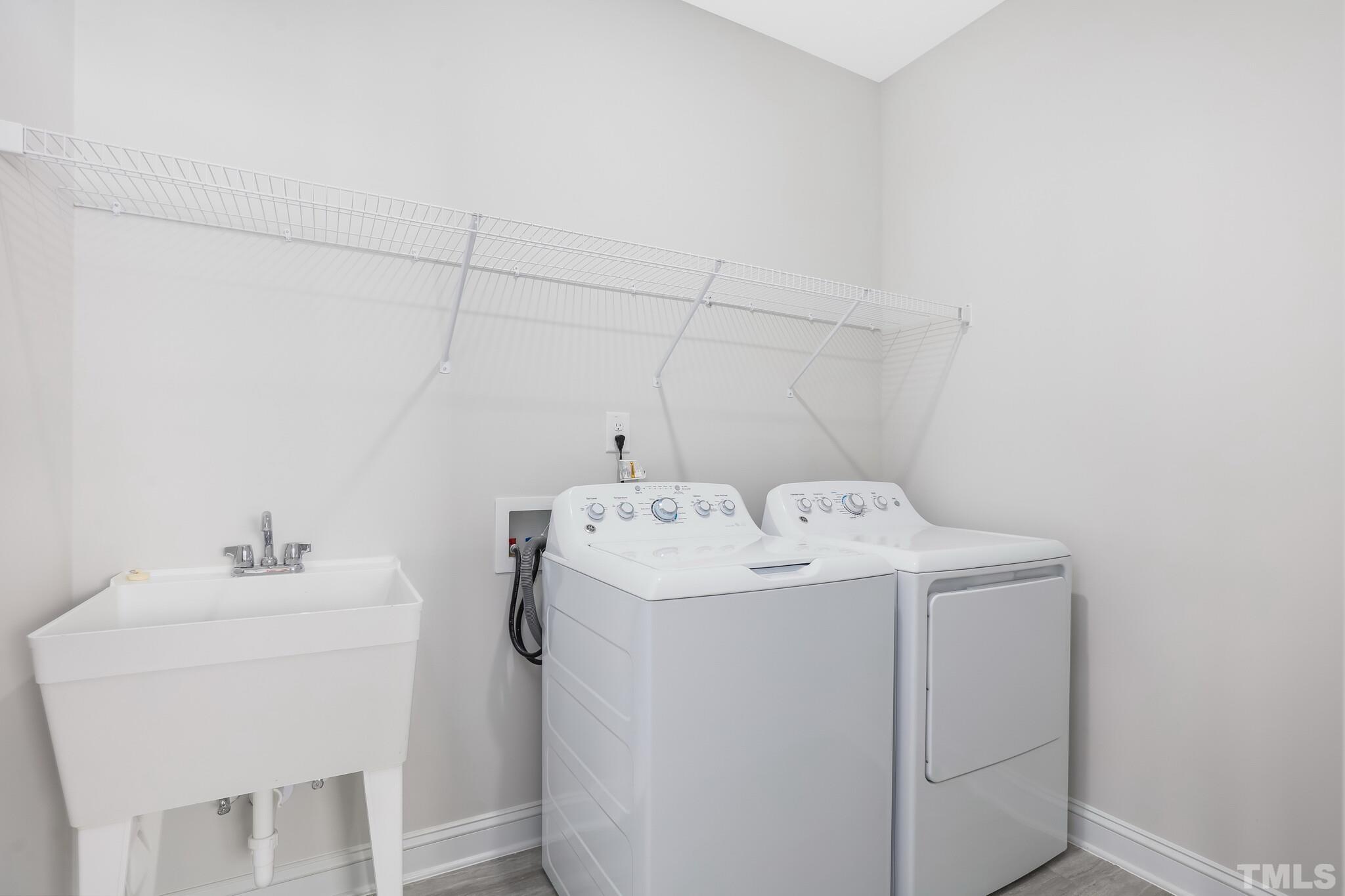 131 Kettleton Circle, Unit 366 Raleigh, NC 27610 - Photo 24 of 38 a utility room with dryer and washer