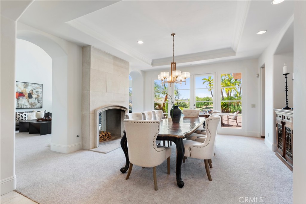 18090 Old Coach Drive Poway, CA 92064 - Photo 11 of 75 a view of a dining room with furniture window and wooden floor