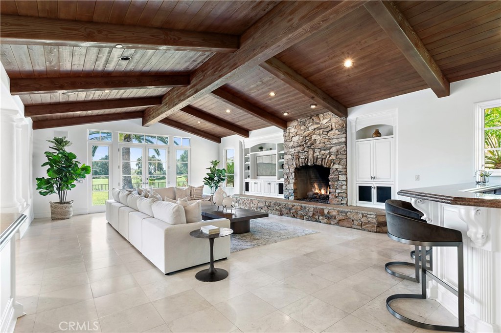18090 Old Coach Drive Poway, CA 92064 - Photo 17 of 75 a living room with furniture and a fireplace