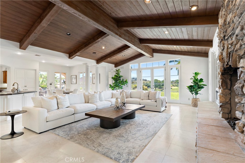 18090 Old Coach Drive Poway, CA 92064 - Photo 19 of 75 a living room with furniture and a large window