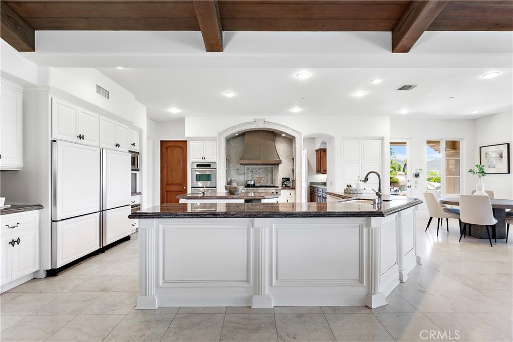 18090 Old Coach Drive Poway, CA 92064 - Photo 27 of 75 a kitchen with counter top space and appliances