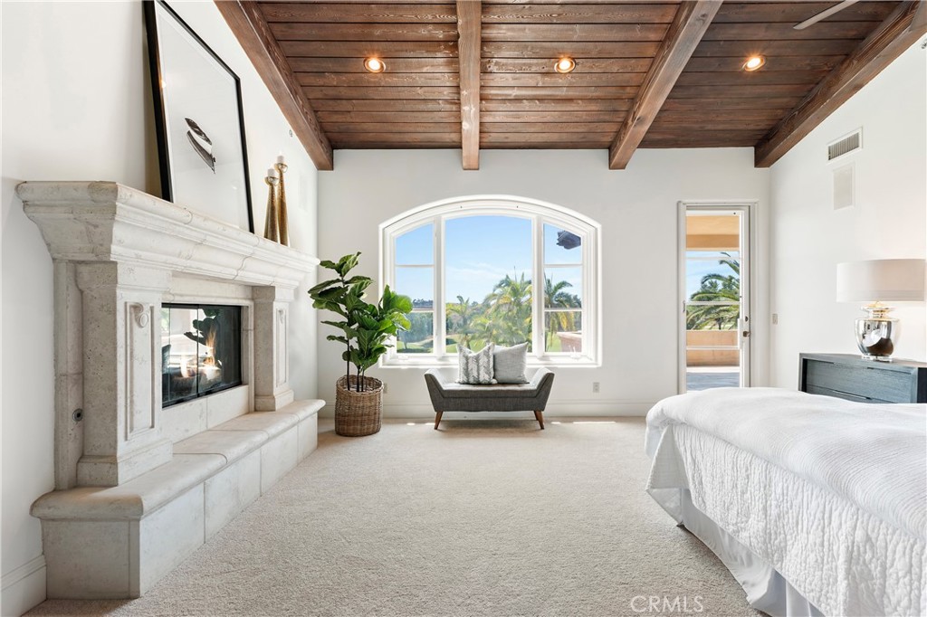 18090 Old Coach Drive Poway, CA 92064 - Photo 36 of 75 a bedroom with furniture and a large window