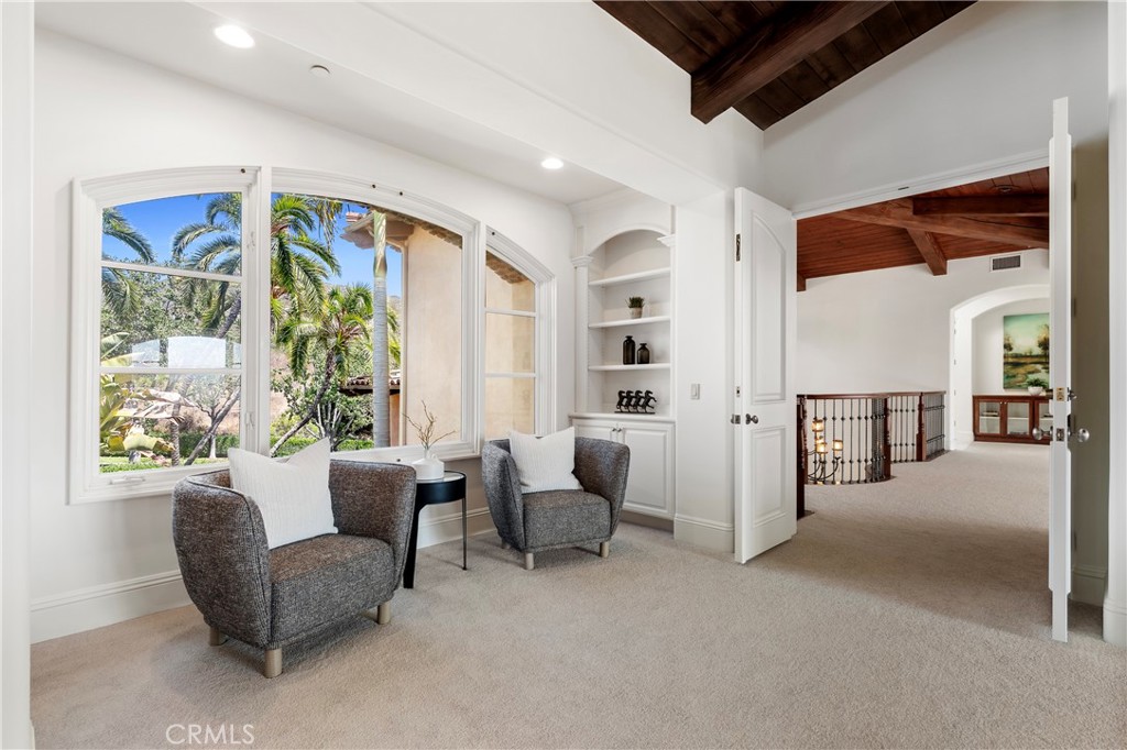 18090 Old Coach Drive Poway, CA 92064 - Photo 38 of 75 a living room with furniture and large windows