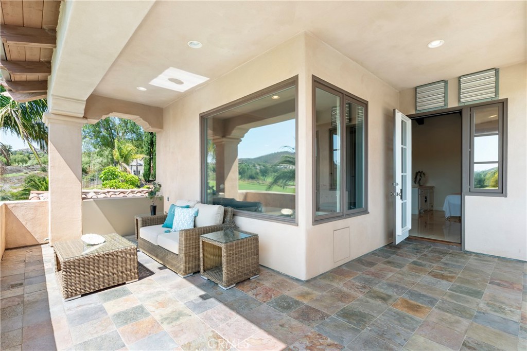 18090 Old Coach Drive Poway, CA 92064 - Photo 41 of 75 a living room with furniture and a large window