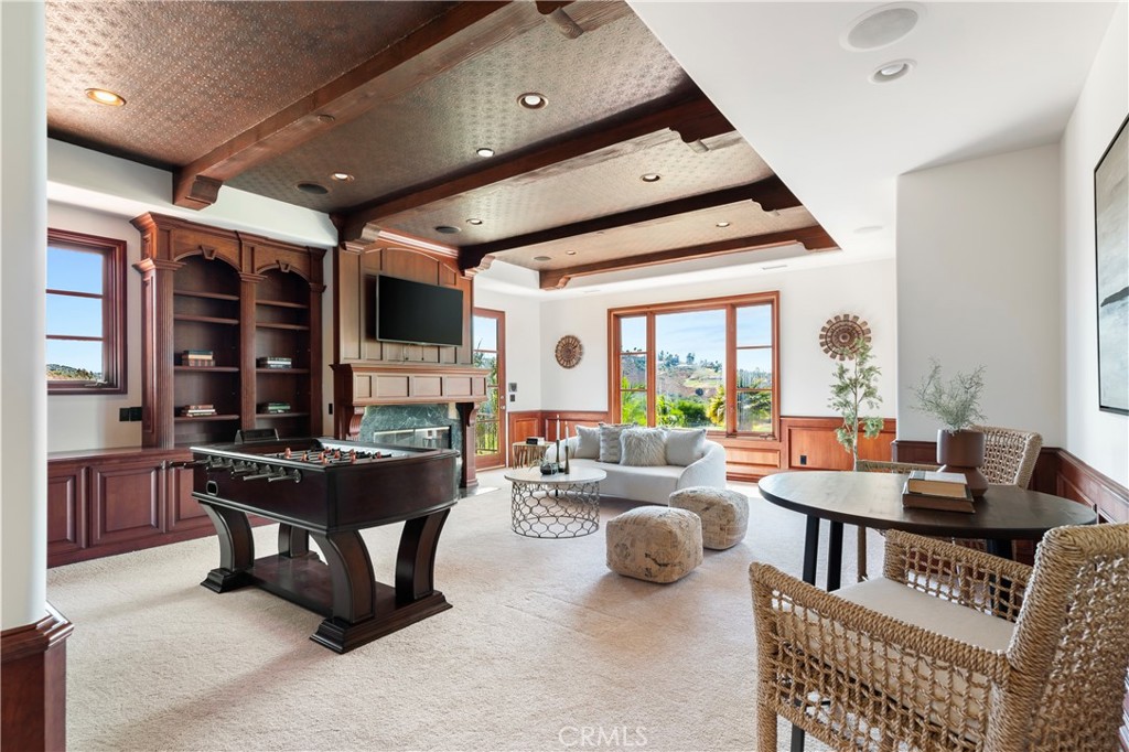 18090 Old Coach Drive Poway, CA 92064 - Photo 51 of 75 a living room with furniture and a fireplace