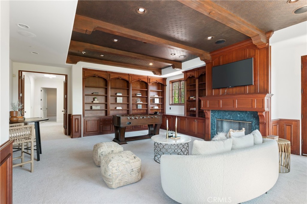 18090 Old Coach Drive Poway, CA 92064 - Photo 53 of 75 a living room with furniture and a flat screen tv
