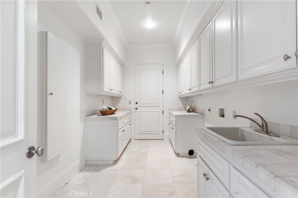 18090 Old Coach Drive Poway, CA 92064 - Photo 58 of 75 a view of kitchen with white cabinets