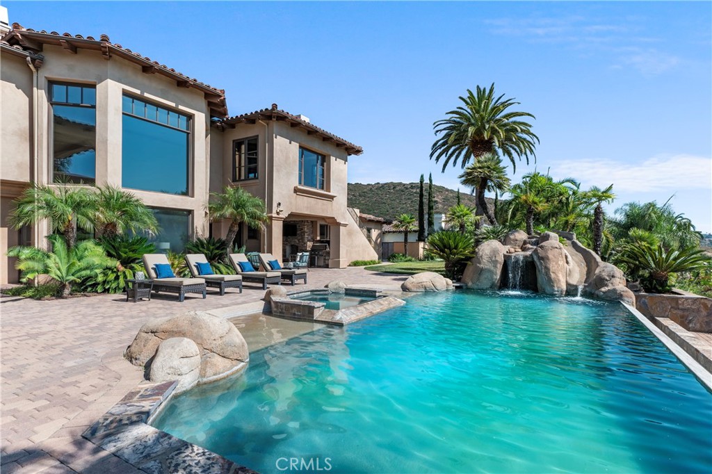 18090 Old Coach Drive Poway, CA 92064 - Photo 71 of 75 a view of a house with swimming pool and sitting area