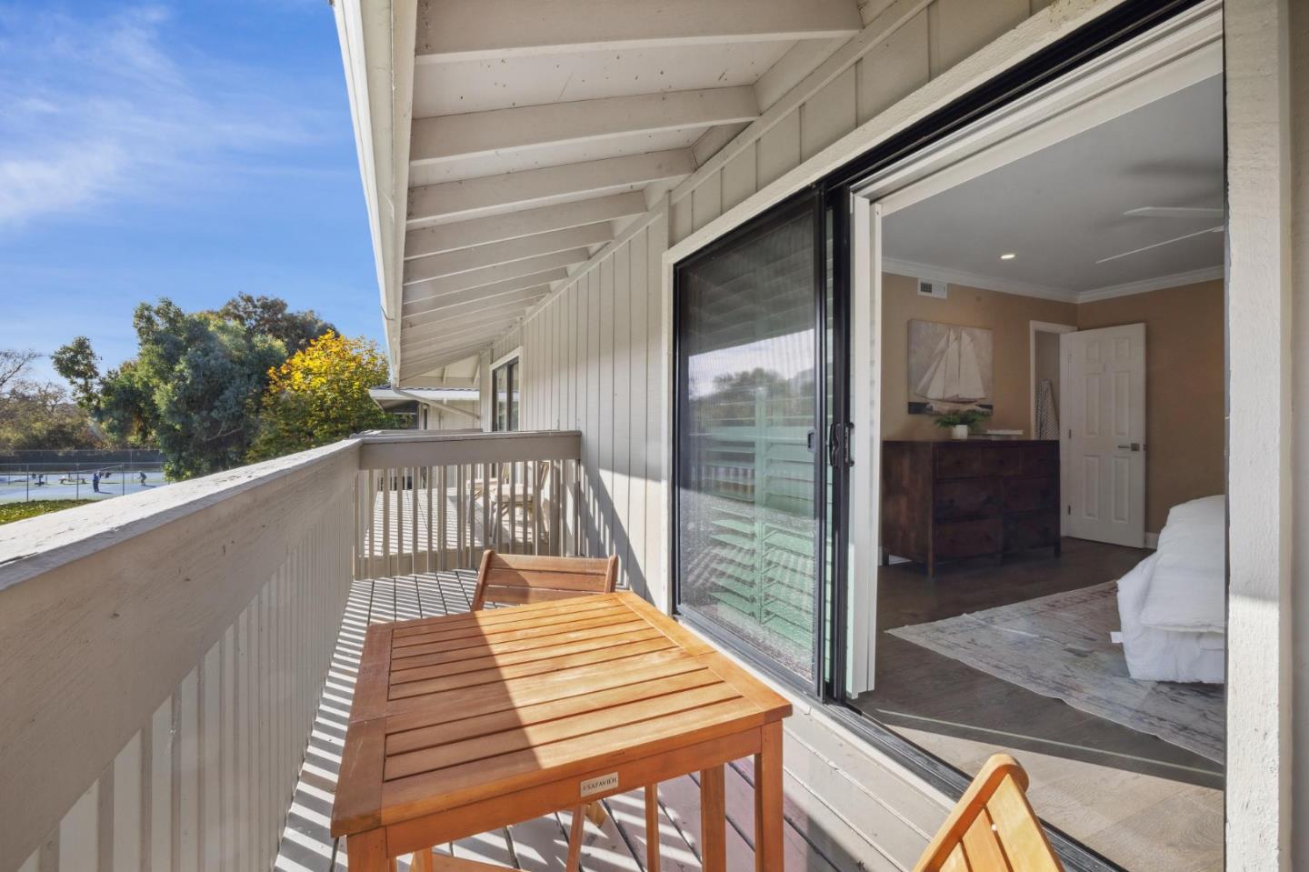 3850 Rio Road, Unit 1 Carmel, CA 93923 - Photo 29 of 46 a view of balcony and wooden floor