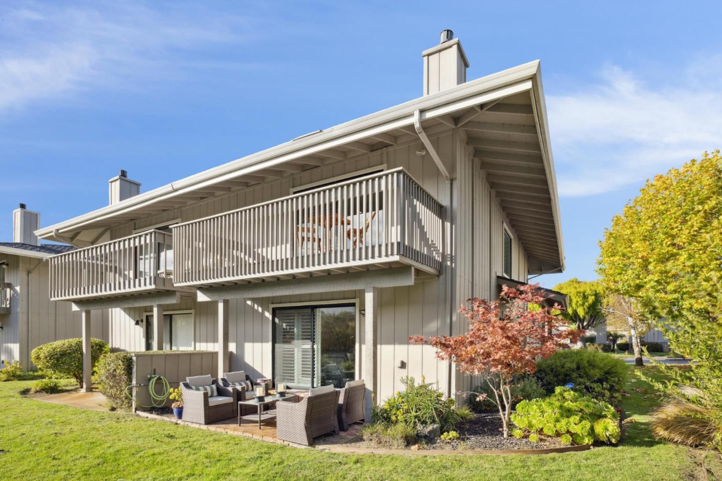 3850 Rio Road, Unit 1 Carmel, CA 93923 - Photo 41 of 46 a front view of a house with garden