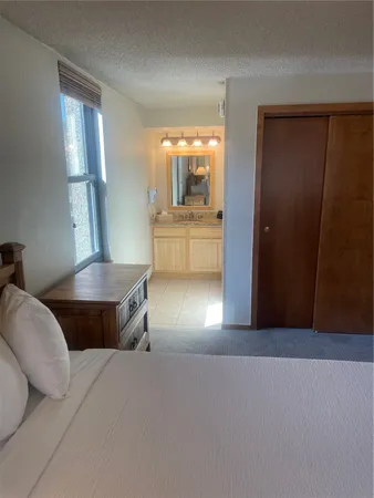 a kitchen with a stove and a microwave