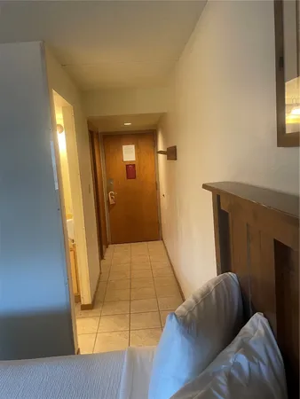 a bathroom with a toilet and shower