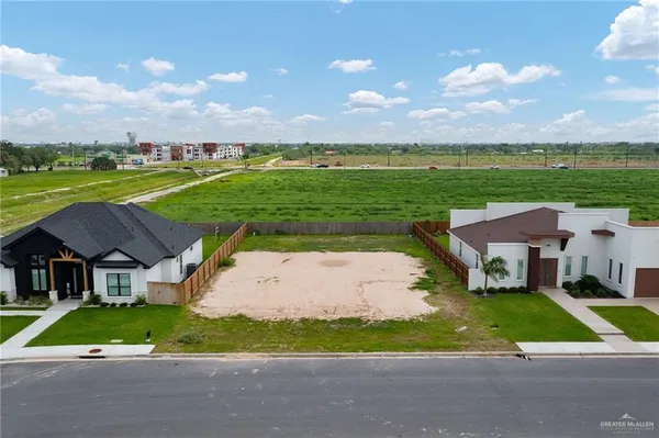 a view of house with garden space and street view