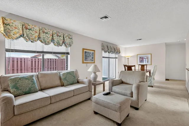 a bedroom with a bed and dresser