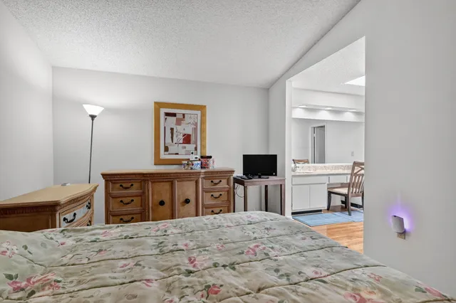a view of a kitchen from a dining room