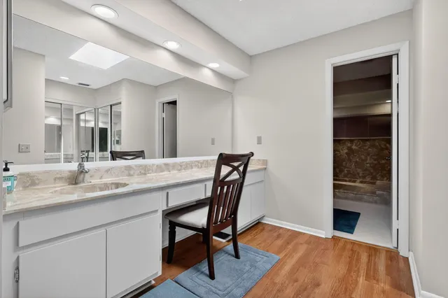 a view of a workspace with furniture