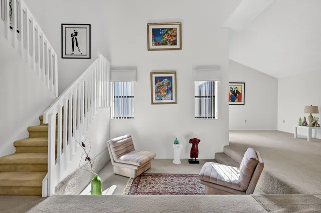 a kitchen with sink cabinets and window