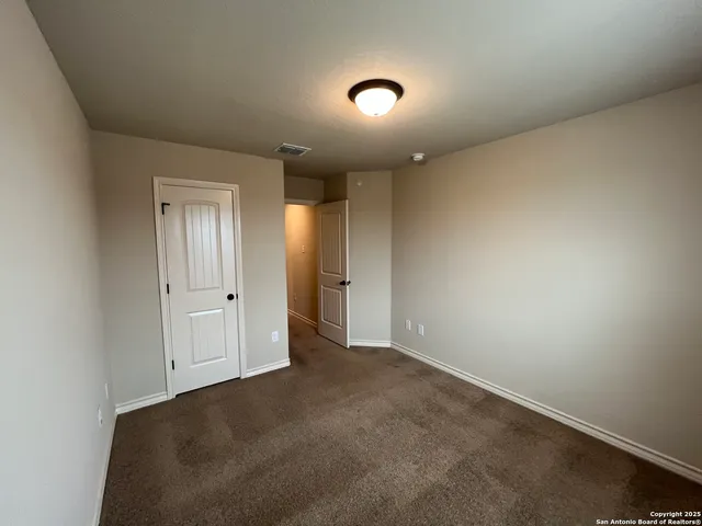 an empty room with an entryway