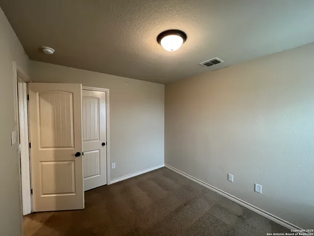 an empty room with a workbench