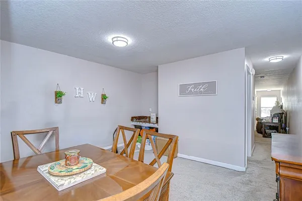 a view of a dining room with furniture
