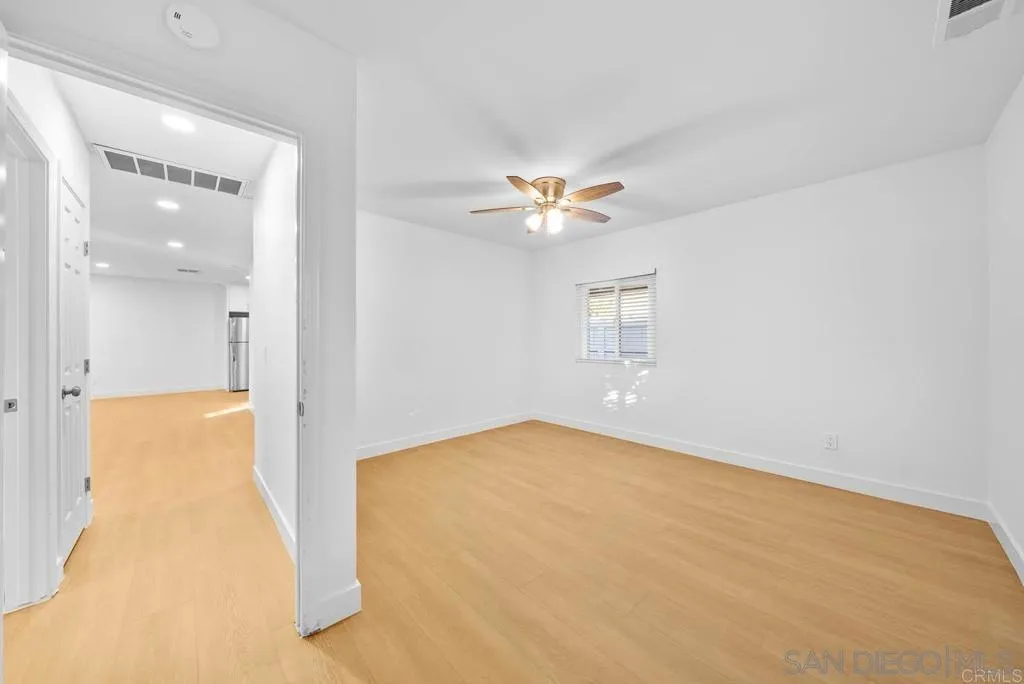 911 Jamacha Road El Cajon, CA 92019 - Photo 33 of 34 a view of an empty room with a chandelier fan