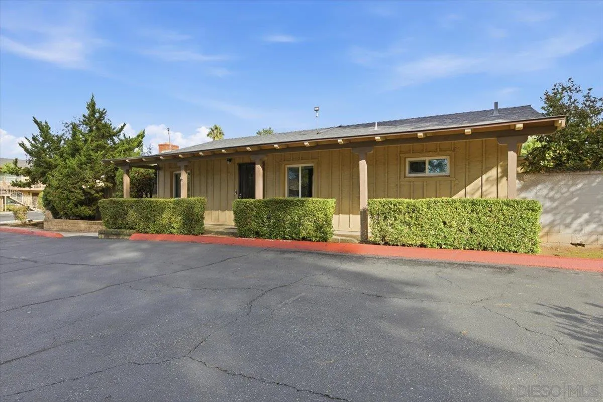 911 Jamacha Road El Cajon, CA 92019 - Photo 4 of 34 a view of a house with a street