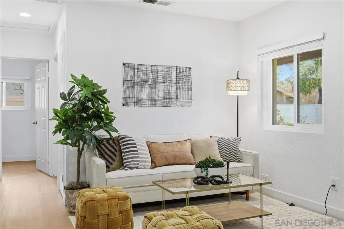 911 Jamacha Road El Cajon, CA 92019 - Photo 6 of 34 a living room with furniture and a potted plant
